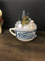 Teacup snow scene